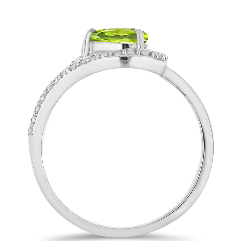 Stříbro 925/1000 - Prsten s Čchang-pajským Peridotem - Karátové číslo: 0.74. přibližná hmotnost: 2.57 gramů