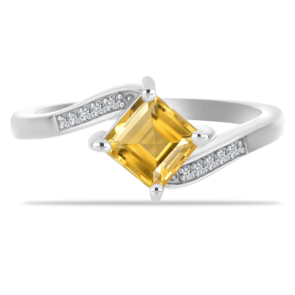 Stříbro 925/1000 - Prsten s Uralským Citrínem a Bílým Topazem - Karátové číslo: 1.21. přibližná hmotnost: 3.09 gramů