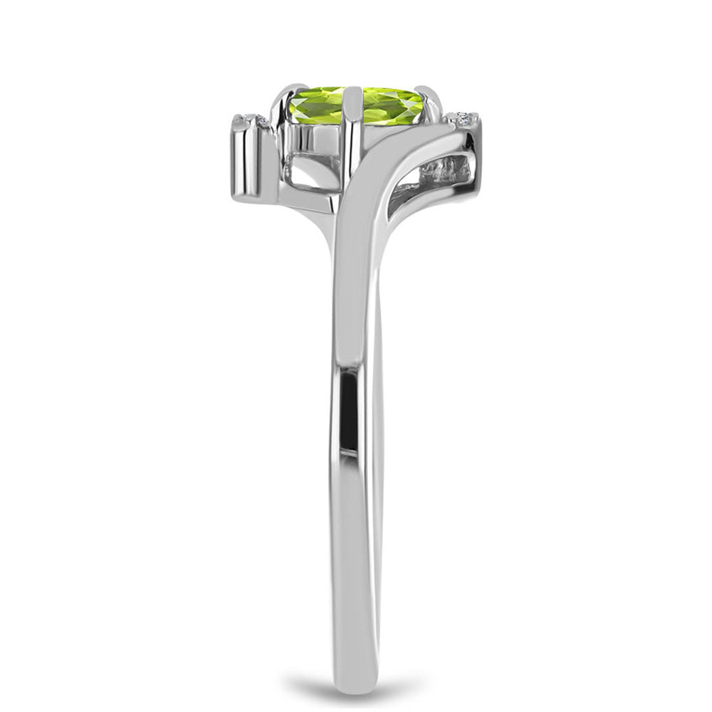 Stříbro 925/1000 - Prsten s Čchang-pajským Peridotem a Bílým Topazem - Karátové číslo: 0.56. přibližná hmotnost: 2.22 gramů