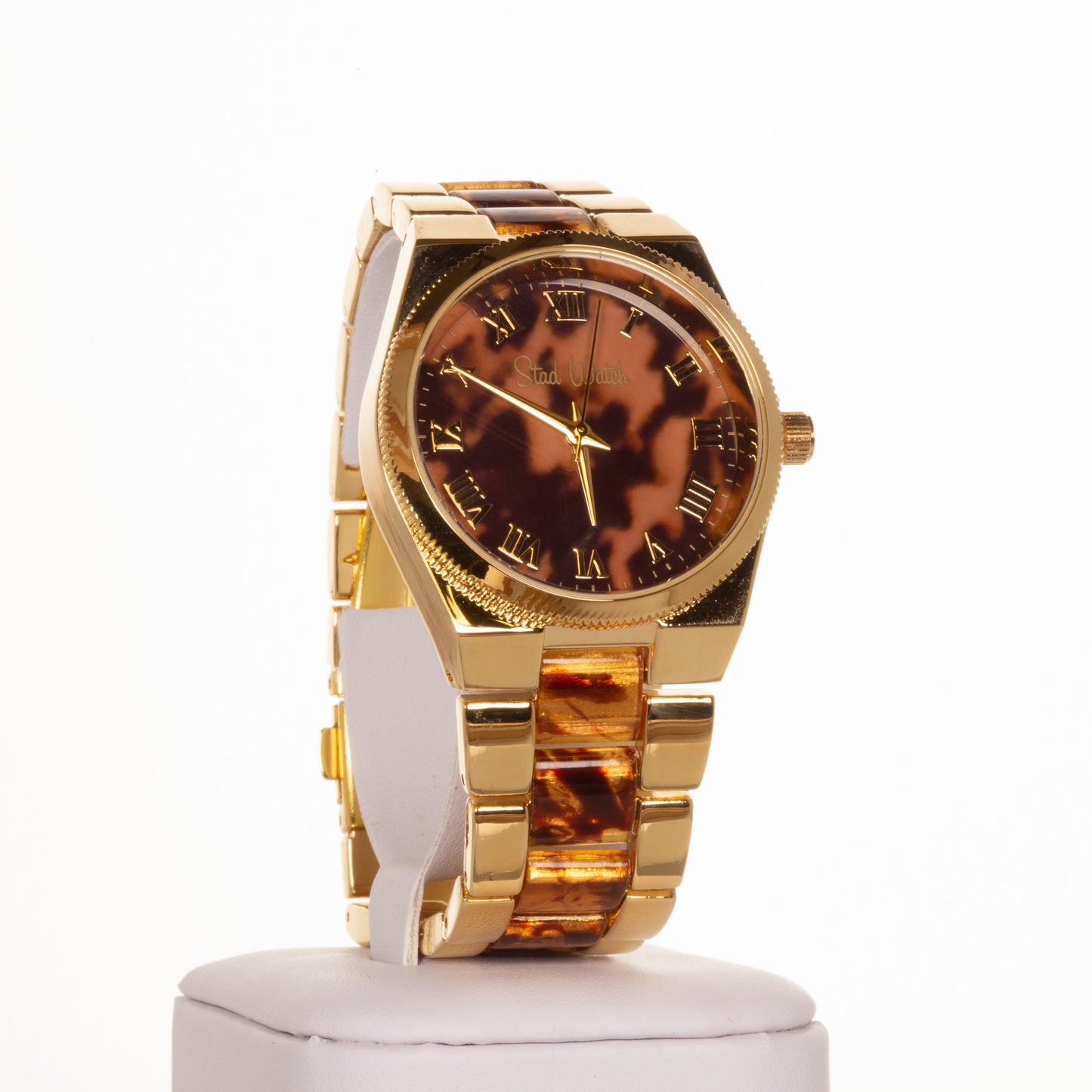 Dámské hodinky zlaté barvy s tygřími proužky a ciferníkem s římskými číslicemi