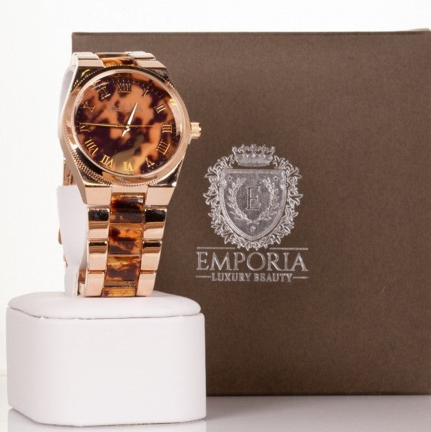 Dámské hodinky v barvě růžového zlata s tygřími proužky a ciferníkem s římskými číslicemi