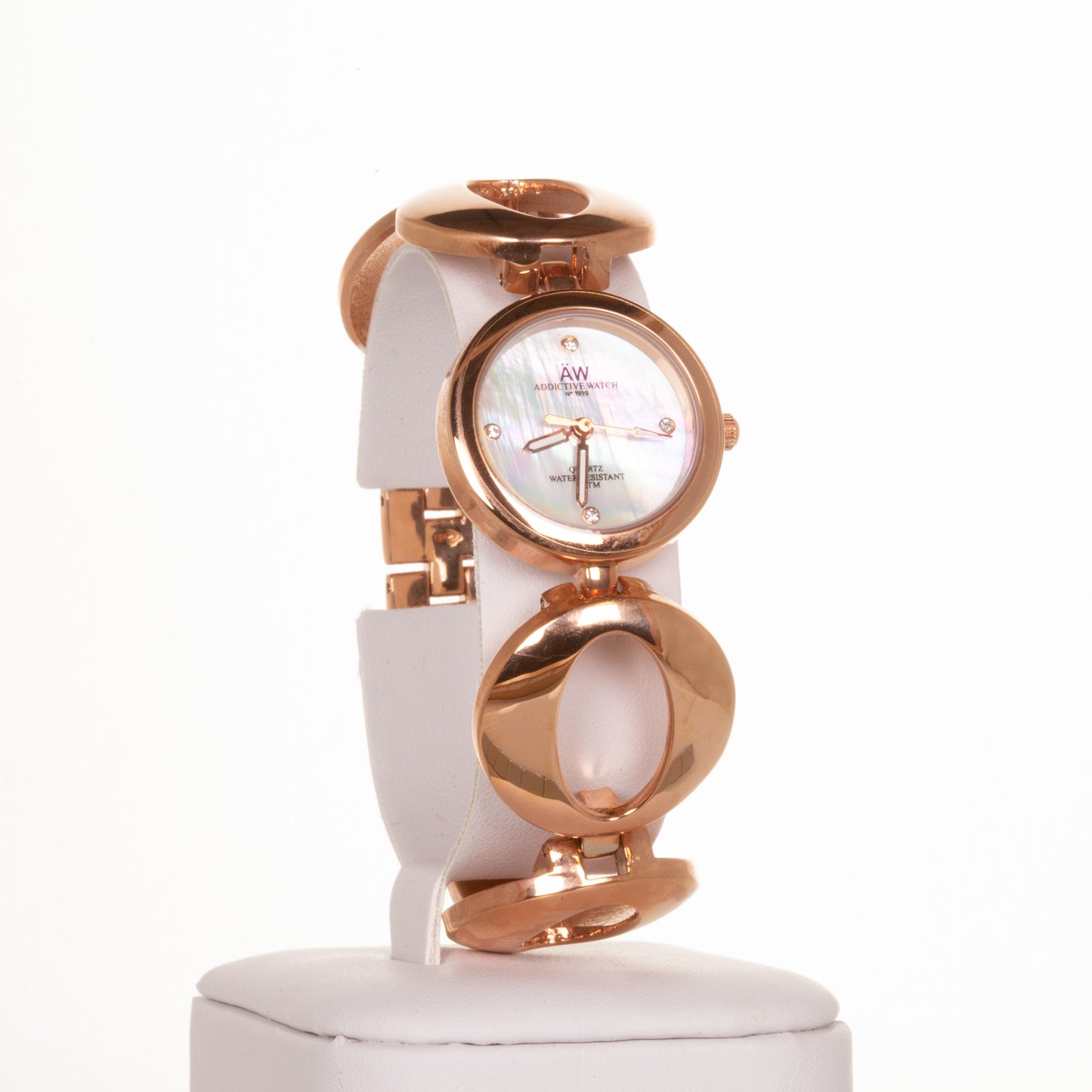AW dámské hodinky v barvě růžového zlata s řemínkem se symbolem nekonečna a 4 krystaly křemenu