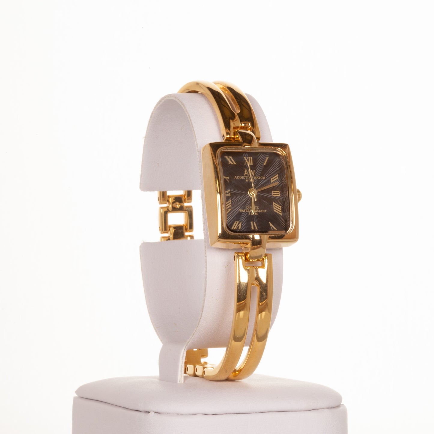 AW dámské hodinky v barvě zlata s černým ciferníkem s římskými číslicemi